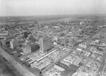 Northwest corner of downtown Dallas, Texas. The First United Methodist Church and Hine Pontiac dealership are in the middle foreground by Squire Haskins Photography Inc.