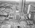 Construction of the Southland Life complex. Dallas High School is directly behind the construction site by Squire Haskins Photography Inc.