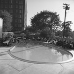 Outdoor meal event around the pool by Squire Haskins Photography Inc.