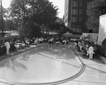 Outdoor meal event around the pool by Squire Haskins Photography Inc.