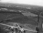 Farmhouses and field by Squire Haskins Photography Inc.