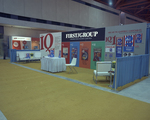 First/Group (or First Group) booth in an exhibit hall by Squire Haskins Photography Inc.