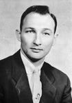 Photograph of a man wearing a jacket and tie by Squire Haskins Photography Inc.