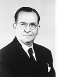 Photograph of a man wearing a jacket and tie by Squire Haskins Photography Inc.