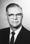 Photograph of a man wearing a jacket and tie by Squire Haskins Photography Inc.