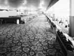 Bowling alley with arena seating by Squire Haskins Photography Inc.