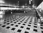 Bowling alley with arena seating by Squire Haskins Photography Inc.