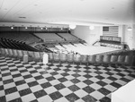 Bowling alley with arena seating by Squire Haskins Photography Inc.