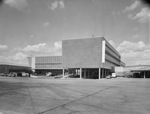 Exterior, Dallas Love Field showing offices and parked cars by Squire Haskins Photography Inc.