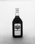 Bottle of Manischewitz Concord Grape Wine by Squire Haskins Photography Inc.