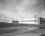 Row of warehouses, one housing Saylite, Inc. by Squire Haskins Photography Inc.