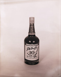 Bottle of J.W. Dant's old style whiskey by Squire Haskins Photography Inc.