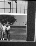 Photograph proofs of two men playing golf by Squire Haskins Photography Inc.