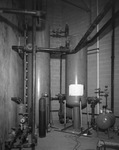 Room containing various tanks and cannisters by Squire Haskins Photography Inc.