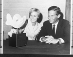 Sculpture created by Kristen McLendon, 1967, man seated with a woman who is possibly the artist by Squire Haskins Photography Inc.