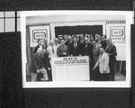 Group of men with banners by Squire Haskins Photography Inc.