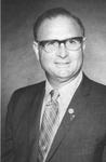 Photograph of a man wearing a business suit by Squire Haskins Photography Inc.