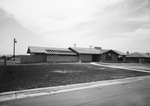 Ranch style home, residential street by Squire Haskins Photography Inc.