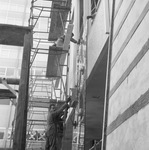 Building under construction, downtown Dallas by Squire Haskins Photography Inc.