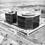 Glass office buildings under construction by Squire Haskins Photography Inc.