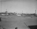 Gas stations line a highway by Squire Haskins Photography Inc.