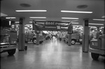 Photograph of trucks likely taken at the Texas State Fair's Auto Show by Squire Haskins Photography Inc.