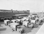 Neuhoff Brothers Packers building with delivery trucks by Squire Haskins Photography Inc.