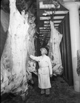 Neuhoff Brothers Packers butcher and hanging butchered cattle by Squire Haskins Photography Inc.