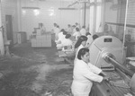 Neuhoff Brothers Packers workers processing meat by Squire Haskins Photography Inc.