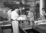 Neuhoff Brothers Packers workers processing meat by Squire Haskins Photography Inc.