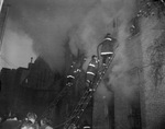 Firefighters battling building fire by Squire Haskins Photography Inc.