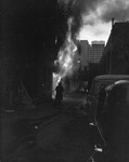 Firefighters battling building fire by Squire Haskins Photography Inc.