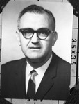 Portrait of a man in a business suit by Squire Haskins Photography Inc.