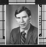 Portrait of a man in a business suit by Squire Haskins Photography Inc.