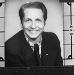 Portrait of a man in a business suit by Squire Haskins Photography Inc.