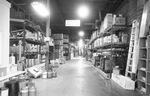 Warehouse storing mostly General Electric machinery by Squire Haskins Photography Inc.