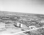 Braniff Airways and Exchange Bank buildings with Dallas Love Field by Squire Haskins Photography Inc.