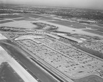 Parking area and runway at Love Field, Dallas by Squire Haskins Photography Inc.