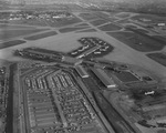 Aerial view of planes at Love Field at 7 a.m., Dallas by Squire Haskins Photography Inc.