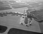 Aerial view of planes at Love Field at 7 a.m., Dallas by Squire Haskins Photography Inc.