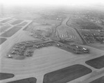 Aerial view of planes at Love Field at 7 a.m., Dallas by Squire Haskins Photography Inc.