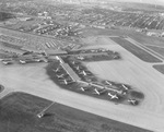 Aerial view of planes at Love Field at 7 a.m., Dallas by Squire Haskins Photography Inc.