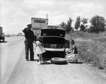 Central Freight Lines personnel helping change a tire by Squire Haskins Photography Inc.