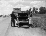 Central Freight Lines personnel helping change a tire by Squire Haskins Photography Inc.