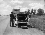 Central Freight Lines personnel helping change a tire by Squire Haskins Photography Inc.