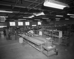 Warehouse, interior with workers by Squire Haskins Photography Inc.