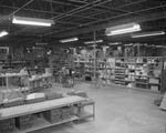 Warehouse, interior with workers by Squire Haskins Photography Inc.