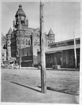 Downtown Dallas street scene in the vicinity of Main, Houston, and Commerce Streets with horse-drawn buggies on street by Squire Haskins Photography Inc.