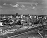 Skyline view of the industrial area looking north toward downtown Dallas, Texas by Squire Haskins Photography Inc.