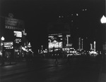 Night street scene, downtown Dallas, Texas by Squire Haskins Photography Inc.